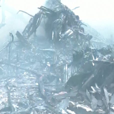 Smoke rises amid debris after an Air India plane crashed in Ahmedabad, India, on June 12, 2025.