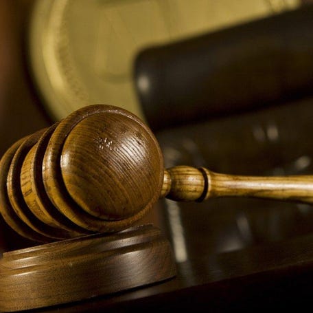 Gavel in courtroom.