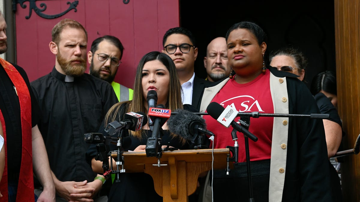 Jennifer Abrego Garcia, wife of Kilmar Abrego Garcia, prays with supporters before her husband’s arraignment at Fred Thompson Federal Courthouse in Nashville, Tenn., Friday, June 13, 2025.