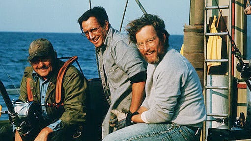 From left: Robert Shaw, Roy Scheider and Richard Dreyfuss standing on boat while filming Steven Spielberg's "Jaws".