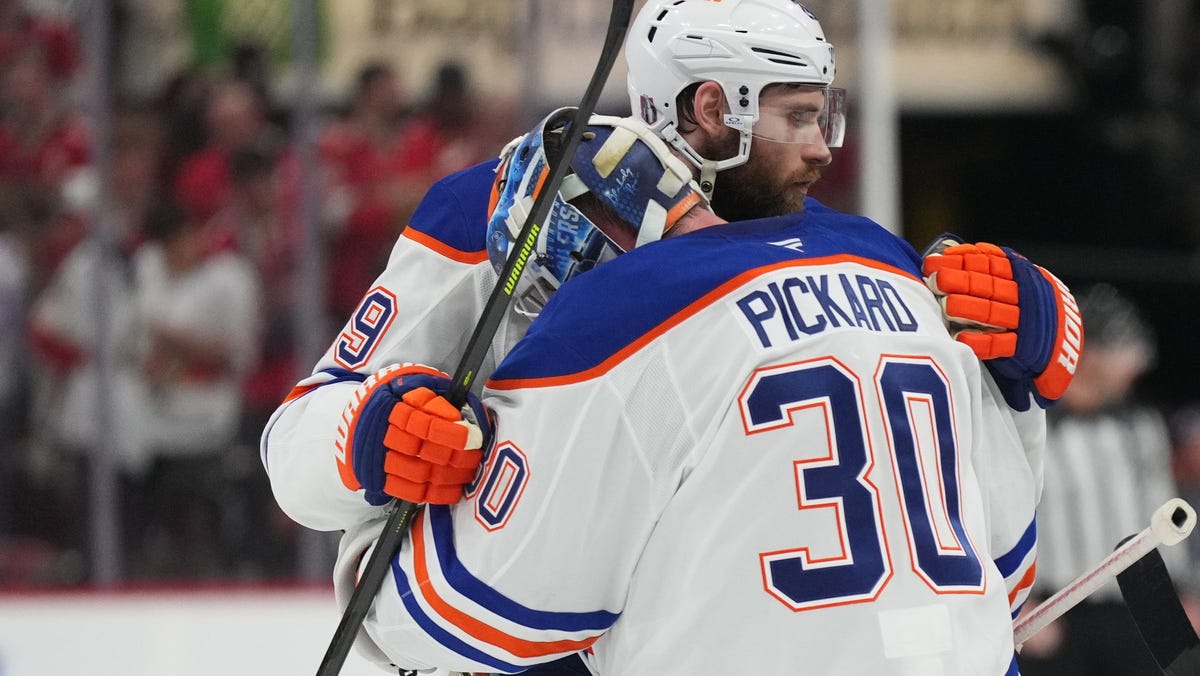 Game 4: Edmonton Oilers center Leon Draisaitl (29), the overtime goal scorer, celebrates with winning goaltender Calvin Pickard (30).
