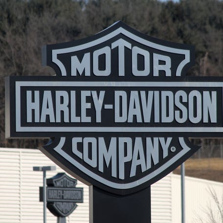 The Harley Davidson sign is displayed on the front lawn as members of International Association of Machinists and Aerospace Workers Local 175 walk the picket line outside the Harley Davidson plant in York, Pennsylvania.