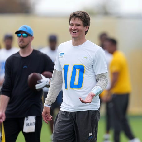 May 12, 2025; El Segundo, CA, USA; Los Angeles Chargers quarterback Justin Herbert (10) reacts during offseason workouts at The Bolt. Mandatory Credit: Kirby Lee-Imagn Images