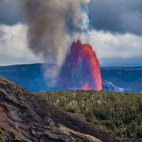 A fountain of lava exceeds 1,000 feet on June 11, 2025, as seen from the Puʻupaʻi overlook, not far from Byron Ledge Trail.