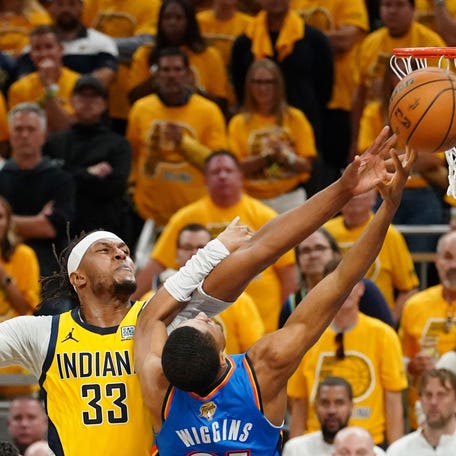 Game 4: Indiana Pacers center Myles Turner (33) blocks the shot of Oklahoma City Thunder guard Aaron Wiggins (21) during the first half.