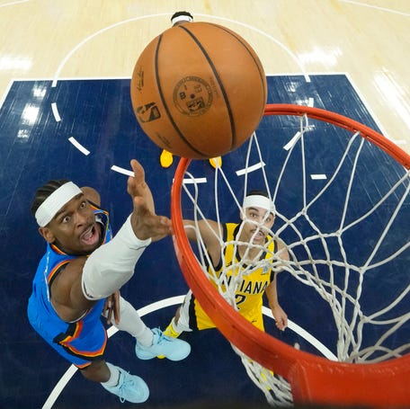 Oklahoma City Thunder guard Shai Gilgeous-Alexander shoots the ball against the Indiana Pacers during the first half of Game 4.