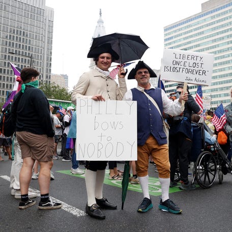 People participate in the "No Kings" protest in Philadelphia, Pennsylvania, June 14, 2025.