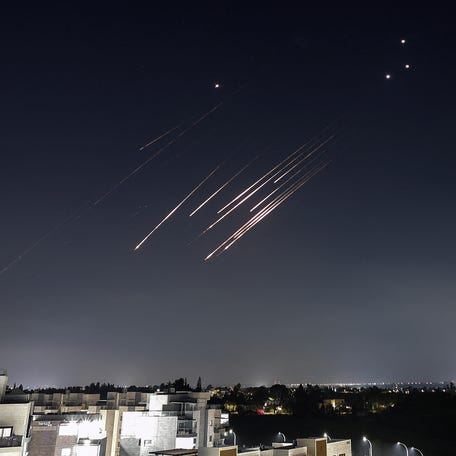 Missiles launched from Iran towards Israel are intercepted, as seen from Gedera, Israel June 14, 2025. REUTERS/Ilan Assayag ISRAEL OUT. NO COMMERCIAL OR EDITORIAL SALES IN ISRAEL  TPX IMAGES OF THE DAY