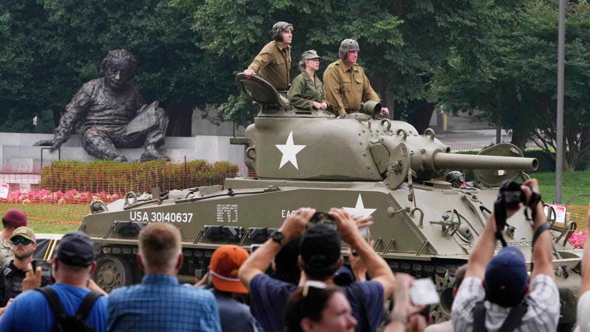 Parade participants drive a WWII era Sherman tank during a celebration marking the 250th anniversary of the U.S. Army in Washington, D.C., on June 14, 2025.