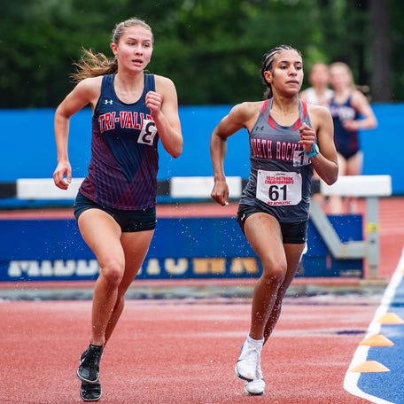 Tri-Valley's Anna Furman, left, and North Rockland's Gaby Castro compete in the girls 2,000 meter steeplechase race during the NYSPHSAA track and field championship meet at Middletown High School in Middletown, NY on Saturday, June 14, 2025.. Kelly Marsh/Special to the Journal News