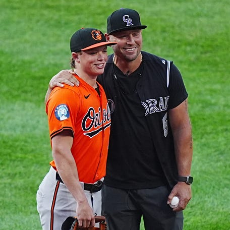Jackson and Matt Holliday before a game at Coors Field in 2014.