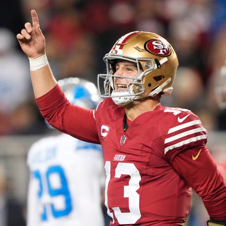 Brock Purdy #13 of the San Francisco 49ers celebrates after his rushing touchdown against the Detroit Lions during the second quarter at Levi's Stadium on December 30, 2024 in Santa Clara, California.