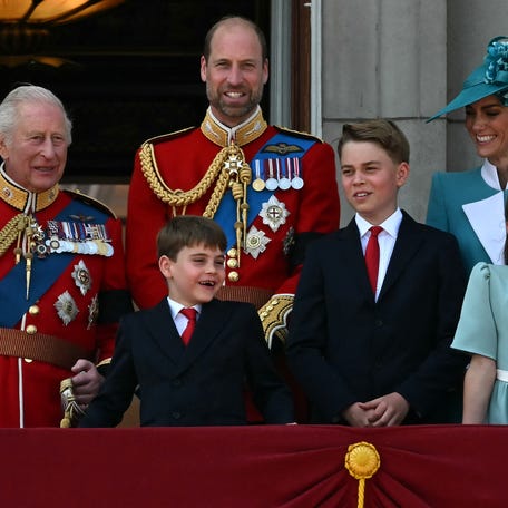 King Charles III (from left), Prince William, Prince Louis, Prince George, Princess Kate and Princess Charlotte stand on the balcony of Buckingham Palace after Trooping the Colour, the official celebration of the king's birthday, in London on June 14, 2025.