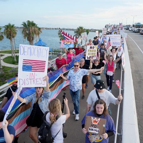 The 'No King's' demonstration against President Trump and his policies on had an estimated 7,000 people that gathered along Sarasota's bayfront. Numerous speakers, and a march over Ringling Bridge, with their 700-foot pride banner were all part of the rally.