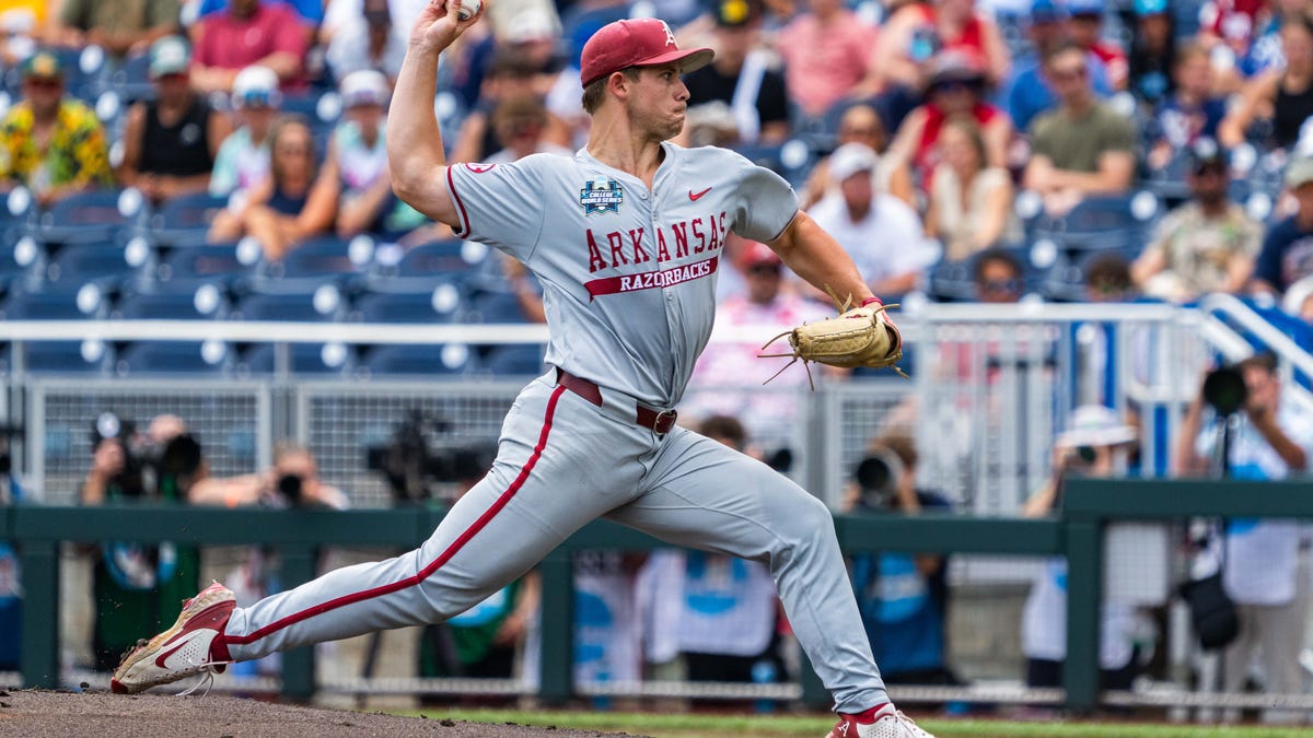 Jun 16, 2025; Omaha, Neb, USA; Arkansas Razorbacks starting pitcher Gage Wood (14) pitches against the Murray State Racers during the first inning at Charles Schwab Field. Mandatory Credit: Dylan Widger-Imagn Images