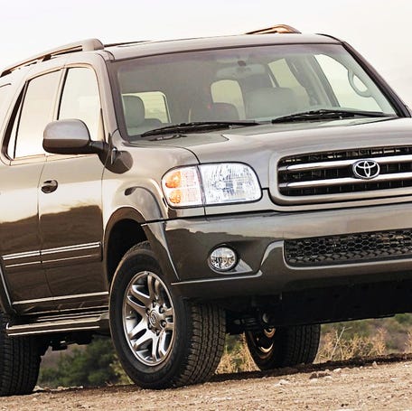 A brown Toyota Sequoia SUV.