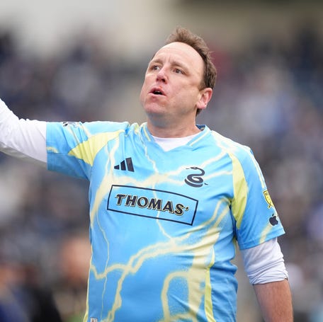 Competitive eater Joey Chestnut entertains fans during a soccer game between the Philadelphia Union and Nashville SC at Subaru Park on March 16, 2025.