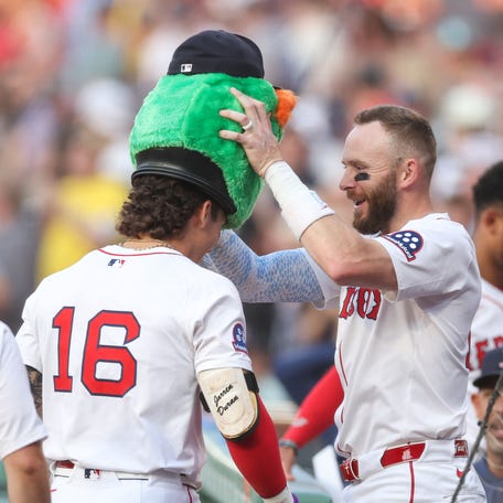 Jarren Duran, left, and Trevor Story celebrate a home run.