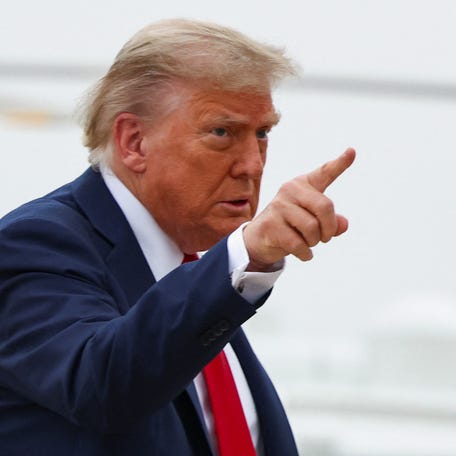 U.S. President Donald Trump points a finger as he departs for Canada to attend the G7 Leaders' Summit, from Joint Base Andrews in Maryland, U.S., June 15, 2025.