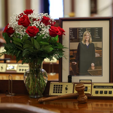 A memorial is seen on the desk of DFL State Rep. Melissa Hortman in the House chambers at the Minnesota State Capitol on June 16, 2025 in St. Paul, Minnesota. Law enforcement agencies captured a suspect in the killing of DFL State Rep. Melissa Hortman and her husband, Mark Hortman, who were shot at their home on June 14. DFL State Sen. John Hoffman and his wife were also shot and hospitalized in a separate incident. Minnesota Gov. Tim Walz said during a press conference that the shooting   "appears to be a politically motivated assassination."