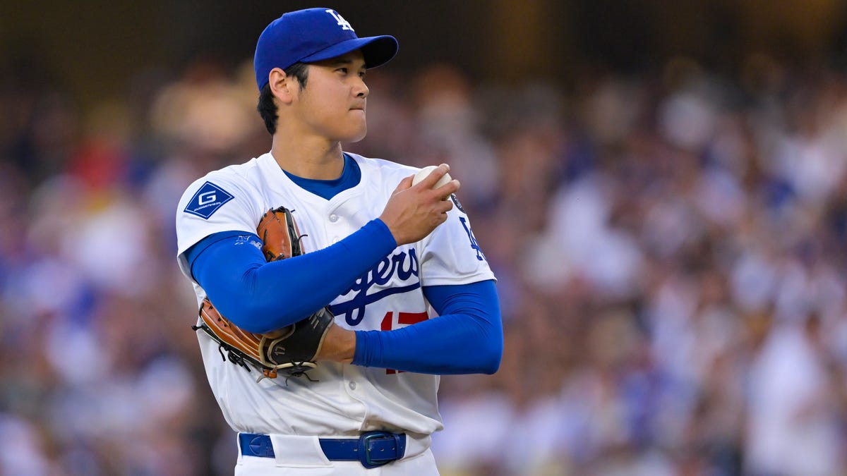 Los Angeles Dodgers designated hitter Shohei Ohtani (17) between pitches during the first inning against the San Diego Padres at Dodger Stadium.