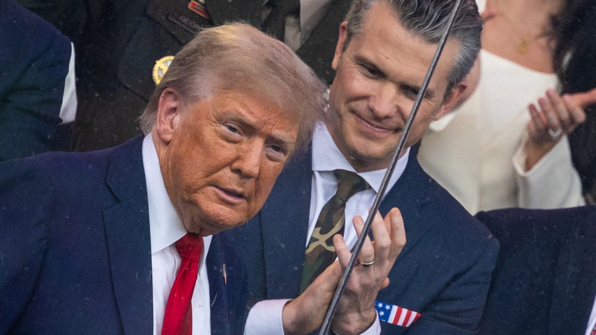 U.S. Secretary of Defense Pete Hegseth and U.S. President Donald Trump attend the U.S. Army's 250th Birthday parade, on the same day of U.S. President Donald Trump 79th birthday, in Washington, D.C., U.S., June 14, 2025.