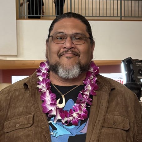 Actress Jocelyn Tecson, from left, David Hekili Kenui Bell and agent Lashauna Downie pose at the Hawaii premiere of "Lilo & Stitch."