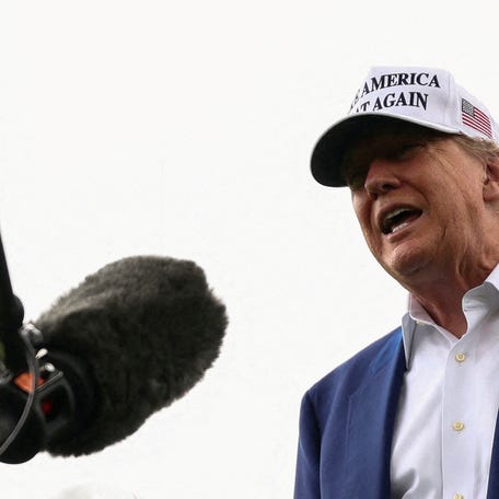 U.S. President Donald Trump speaks to members of the media during the installation of a new flagpole on the South Lawn at the White House in Washington, D.C., U.S., June 18, 2025. REUTERS/Kevin Lamarque