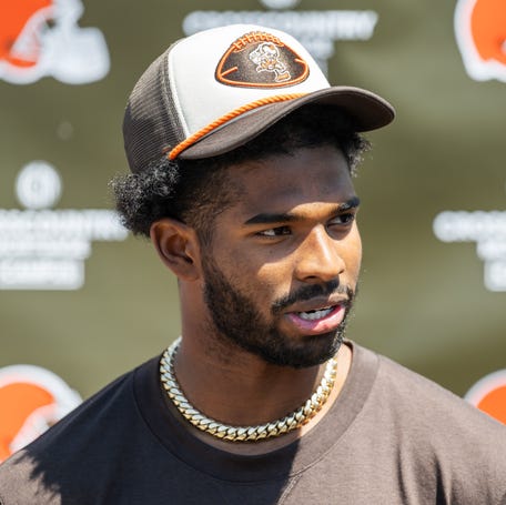 Cleveland Browns quarterback Shedeur Sanders (12) talks to the media during rookie minicamp at CrossCountry Mortgage Campus.