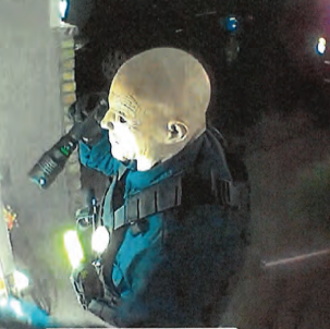 Court filings provide this photo of suspect Vance Boelter knocking on one of the victim's doors before shots rang out on May 14, 2025."This is the police," he shouted. "Open the door."