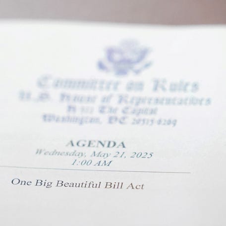 FILE PHOTO: A view of an agenda with the words "One Big Beautiful Bill Act" printed on it, on the day of a House Rules Committee's hearing on U.S. President Donald Trump's plan for extensive tax cuts, on Capitol Hill, in Washington, D.C., U.S., May 21, 2025. REUTERS/Nathan Howard/File Photo