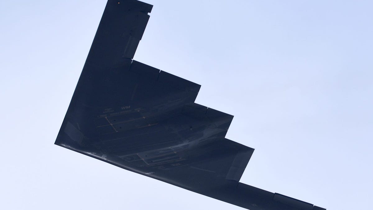 A B2 bomber flies over the Missouri Capitol Building Monday during Gov. Mike Parson'Inauguration. [Don Shrubshell/Tribune] 20210111 108a 2021 Gov Parson Inauguration Ds