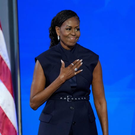 Former first lady Michelle Obama speaks during the second day of the Democratic National Convention at the United Center.