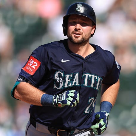 Mariners slugger Cal Raleigh celebrates a home run against the Cubs at Wrigley Field in Chicago on June 21, 2025.