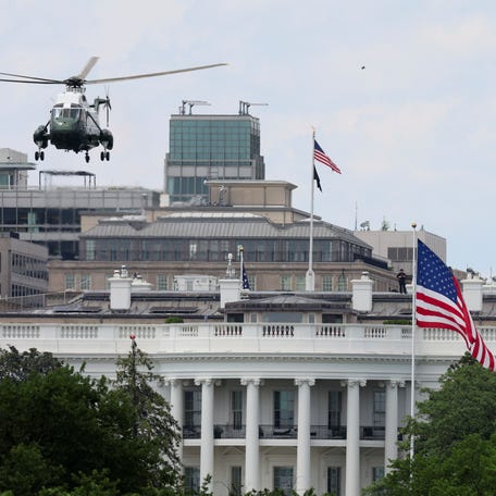 A U.S. flag flies on a new flagpole as Marine One departs the South Lawn with U.S. President Donald Trump, at the White House in Washington, D.C., U.S., June 20, 2025. REUTERS/Kevin Mohatt
