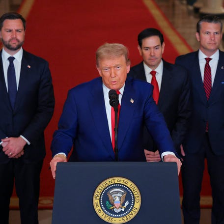 US President Donald Trump addresses the nation, alongside US Vice President JD Vance (L), US Secretary of State Marco Rubio (2nd R) and US Secretary of Defense Pete Hegseth (R), from the White House in Washington, DC on June 21, 2025, following the announcement that the US bombed nuclear sites in Iran. President Donald Trump said June 21, 2025 the US military has carried out a "very successful attack" on three Iranian nuclear sites, including the underground uranium enrichment facility   at Fordo. "We have completed our very successful attack on the three Nuclear sites in Iran, including Fordow, Natanz, and Esfahan," Trump said in a post on his Truth Social platform. (Photo by Carlos Barria / POOL / AFP) (Photo by CARLOS BARRIA/POOL/AFP via Getty Images)