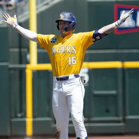 June 22: LSU's Ethan Frey gestures toward the bench after driving in a run with a double against Coastal Carolina during the third inning.