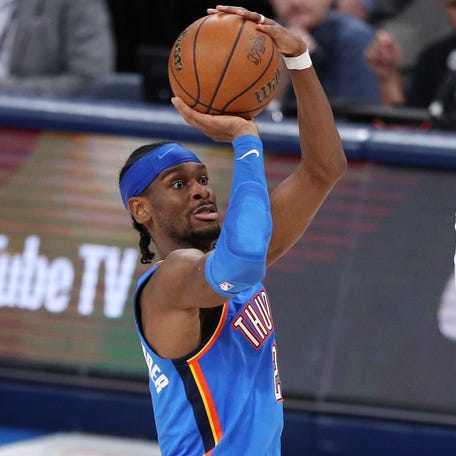The Oklahoma City's Thunder Shai Gilgeous-Alexander attempts a jump shot against the Indiana Pacers' Andrew Nembhard during Game 78 of the 2025 NBA Finals.