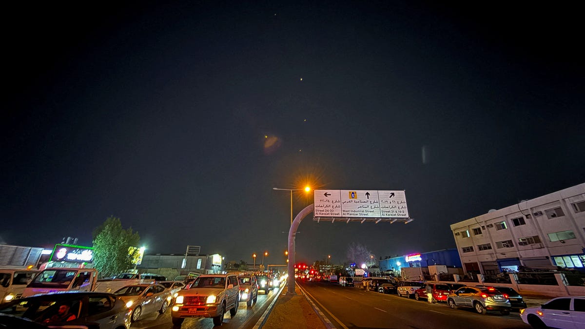 Traces are seen in the sky after Iran's armed forces say they targeted The Al-Udeid base in a missile attack, as seen from Doha, Qatar, June 23, 2025.