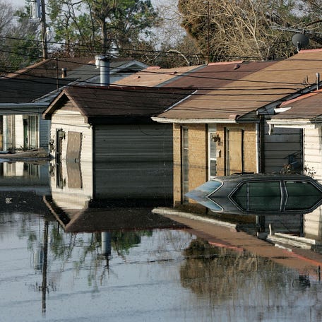 Homes are submerged in water September 15, 2005 in the Lakeview District of New Orleans, Louisiana, more than two weeks after Hurricane Katrina hit the area.