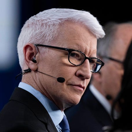 CNN journalist Anderson Cooper looks on in the spin room after the fifth Republican presidential primary debate at Drake University in Des Moines, Iowa, on January 10, 2024.