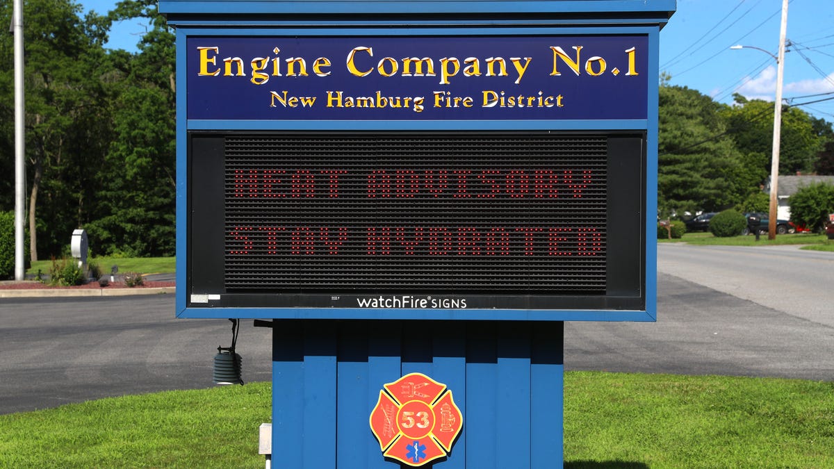 A sign at the New Hamburg Fire District Engine Company No. 1 encourages people to stay hydrated during the heat advisory on June 25, 2025.