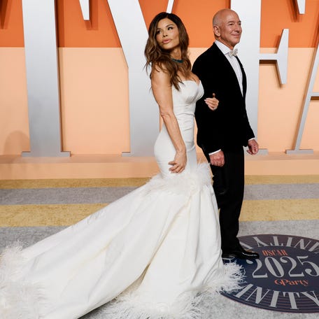 Jeff Bezos and Lauren Sánchez arrive at the Vanity Fair Oscars party in Beverly Hills, California, on March 2, 2025.