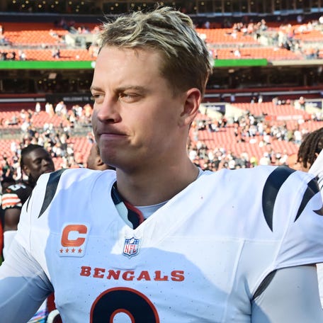 Oct 20, 2024; Cleveland, Ohio, USA; Cincinnati Bengals quarterback Joe Burrow (9) and Cleveland Browns defensive end Myles Garrett (95) talk after the game at Huntington Bank Field. Mandatory Credit: Ken Blaze-Imagn Images