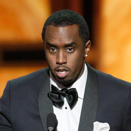 Sean "Diddy" Combs accepts the accepts a trophy for "A Raisin In The Sun" during the 40th NAACP Image Awards at the Shrine Auditorium on Feb. 12, 2009, in Los Angeles.