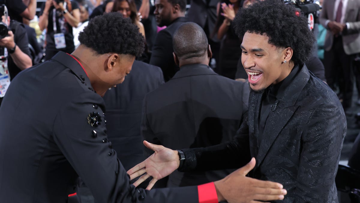 Dylan Harper celebrates with Ace Bailey after being selected by the San Antonio Spurs with the second pick in the draft.