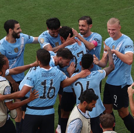 Manchester City forward Erling Haaland (9, R) celebrates a goal with teammates during a group stage match of the 2025 FIFA Club World Cup at Camping World Stadium on June 26, 2025.