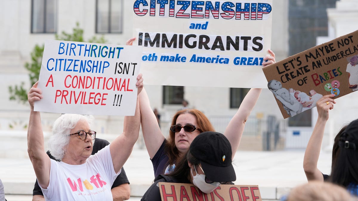 People rally outside the Supreme Court for birthright citizenship on May 15, 2025.