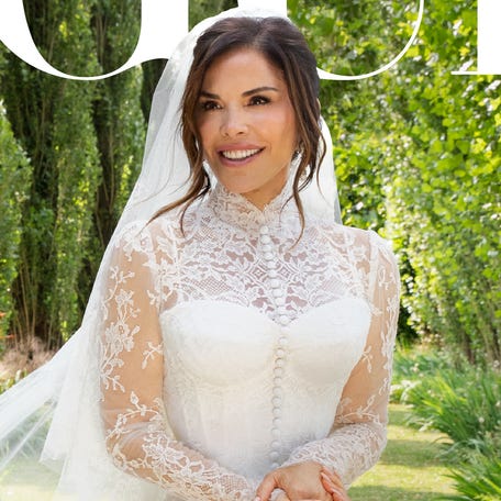 Lauren Sánchez Bezos poses in her custom Dolce & Gabbana wedding dress ahead of her June 27, 2025, wedding to Amazon founder Jeff Bezos. The gown was "an homage to the iconic look worn by Sophia Loren in the 1958 film Houseboat," per Vogue Magazine.