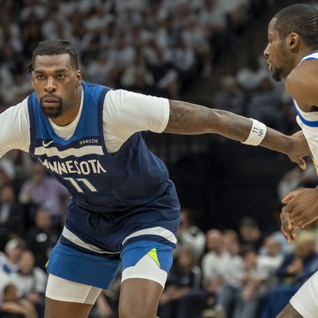 Minnesota Timberwolves center Naz Reid (11) dribbles the ball against the Golden State Warriors in the first half during game five of the second round for the 2025 NBA Playoffs at Target Center in Minneapolis, Minnesota on May 14, 2025.
